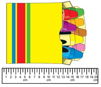 Box of crayons above a ruler 
